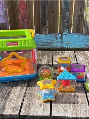 Fisher-Price Multicolor Shape Sorter with Green Lid and Blue Base